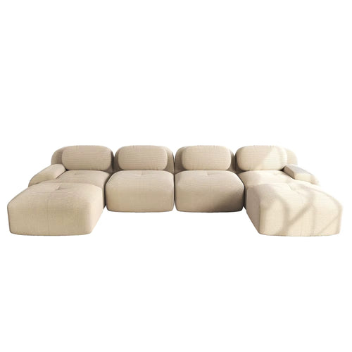 Canapé modulable quatre places Veloura en velours côtelé